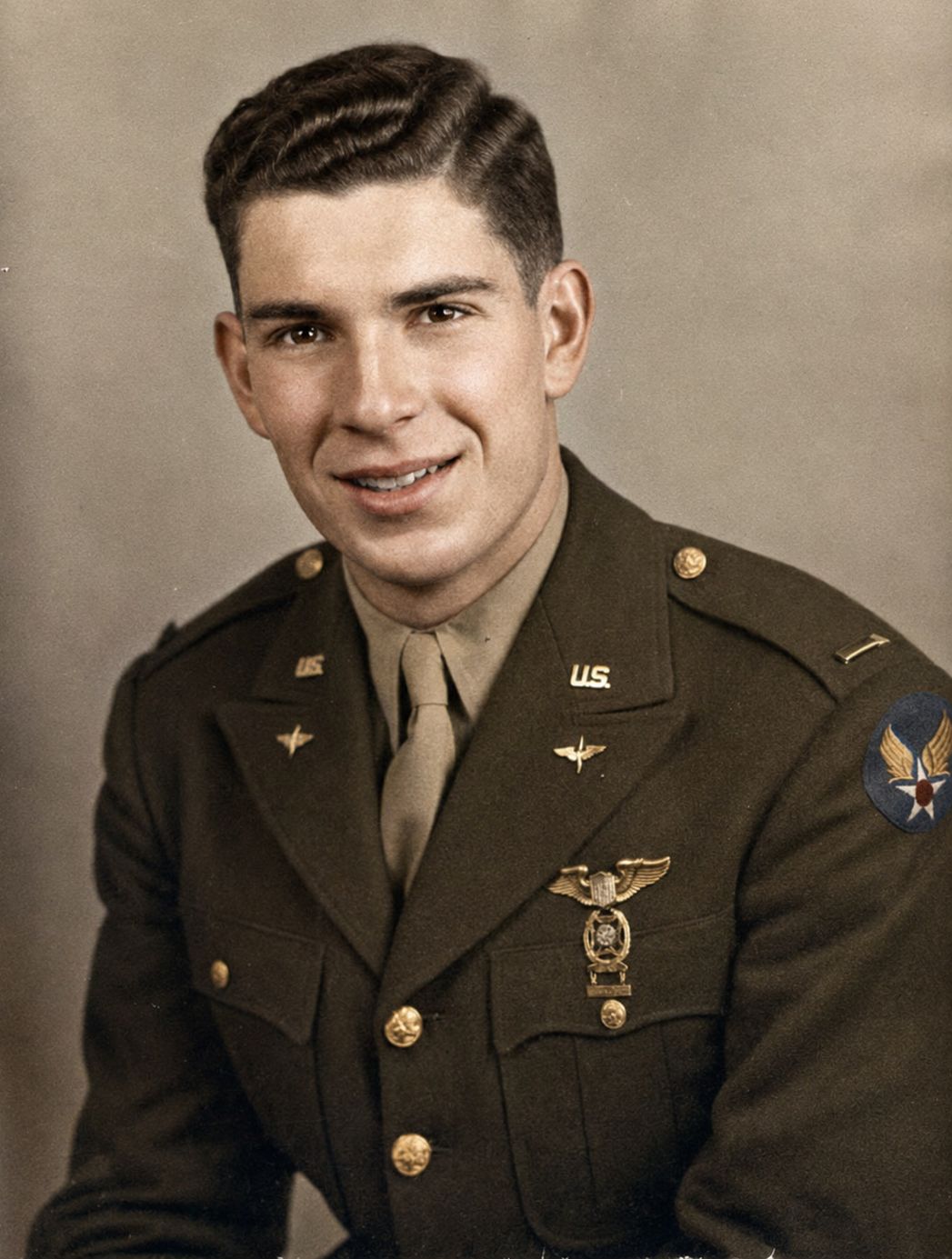 Formal portrait of Andrew Nicholas Kandis in USAAF officer's uniform with pilot's wings